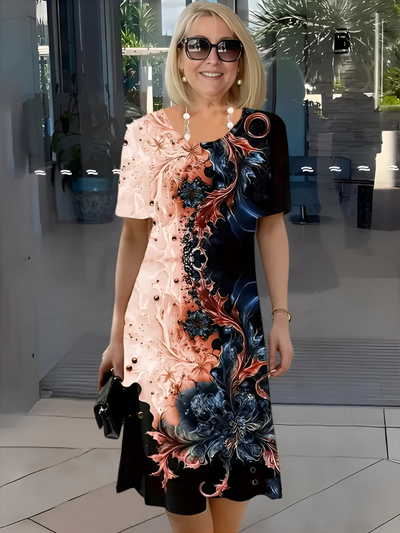 LEANDRIA | AFSLAPPET BLOMSTRET MIDI KJOLE