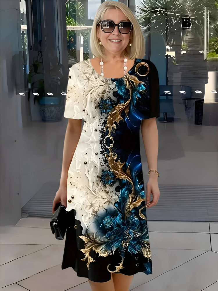 LEANDRIA | AFSLAPPET BLOMSTRET MIDI KJOLE