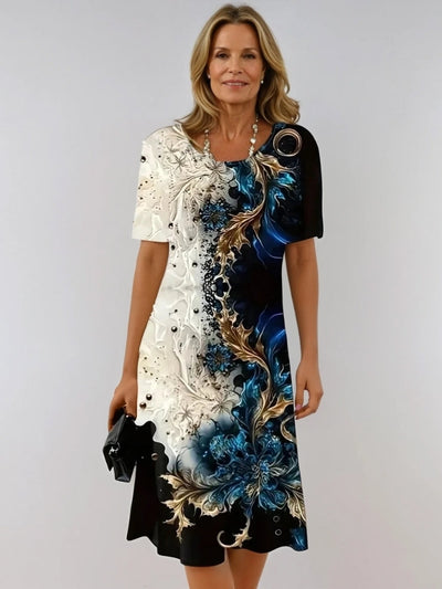 LEANDRIA | AFSLAPPET BLOMSTRET MIDI KJOLE